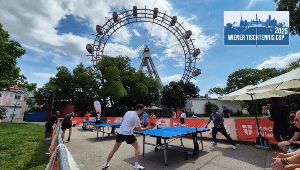 Früh ankommende Zuschauer genießen das spannende Tischtennis Event vor dem Wiener Riesenrad - ein mitreißendes Erlebnis bei „Tischtennis vor dem Wiener Riesenrad“.